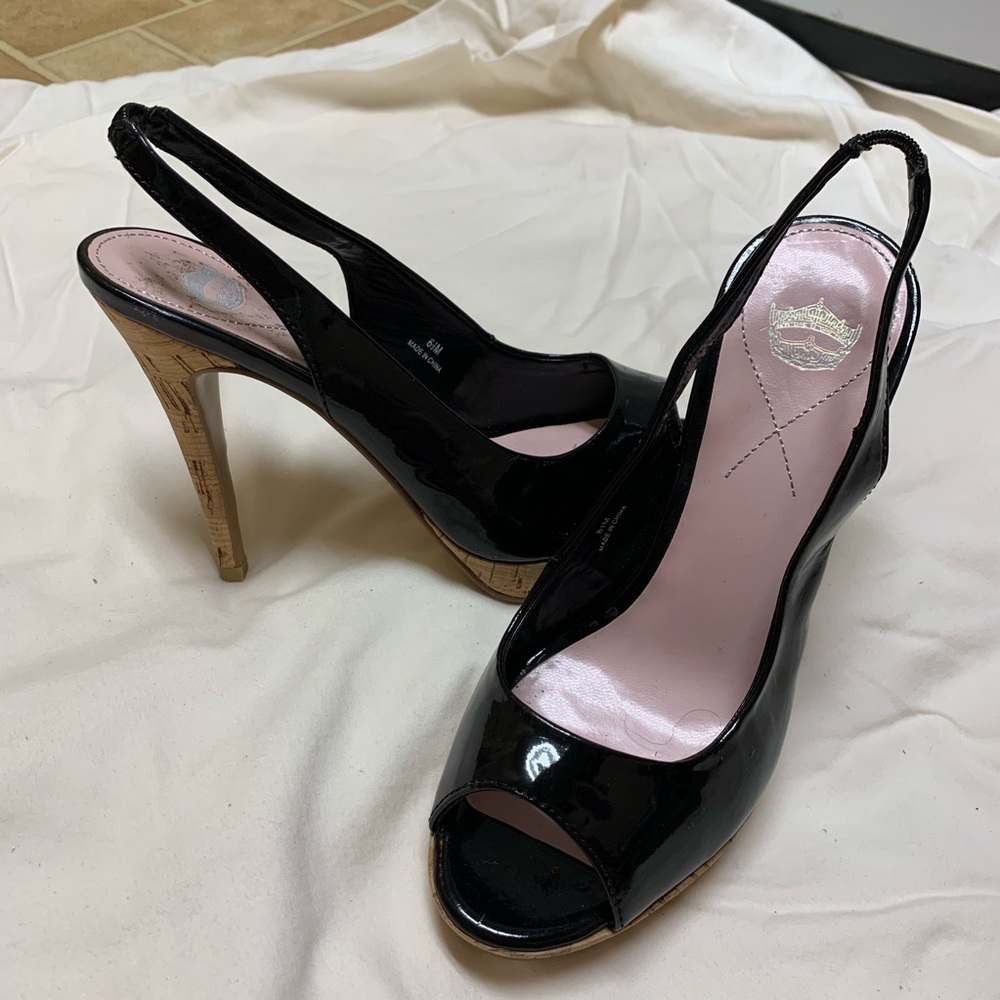 Black heels with crown logo